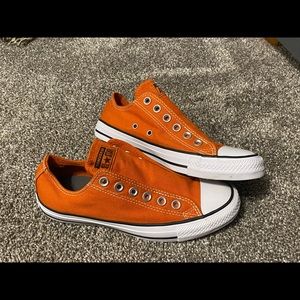 Never worn Chuck Taylor All Stars size 7 orange